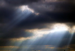 Sunlight through the clouds.